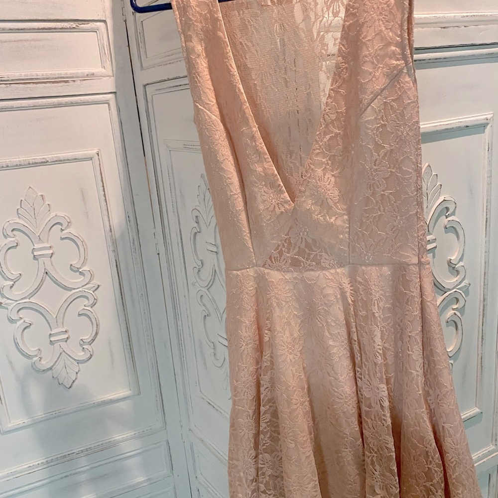 Adorable pink dress with see-through lace. Super feminine and elegant!